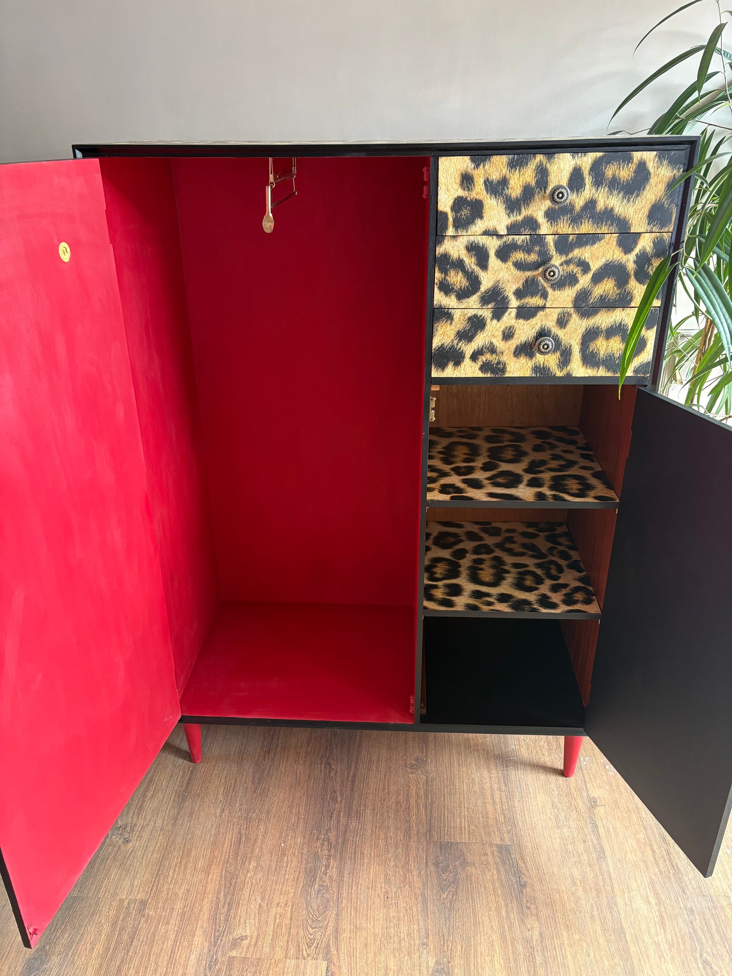 Leopard print wallpapered storage cabinet gentleman’s wardrobe upcycled refurbished