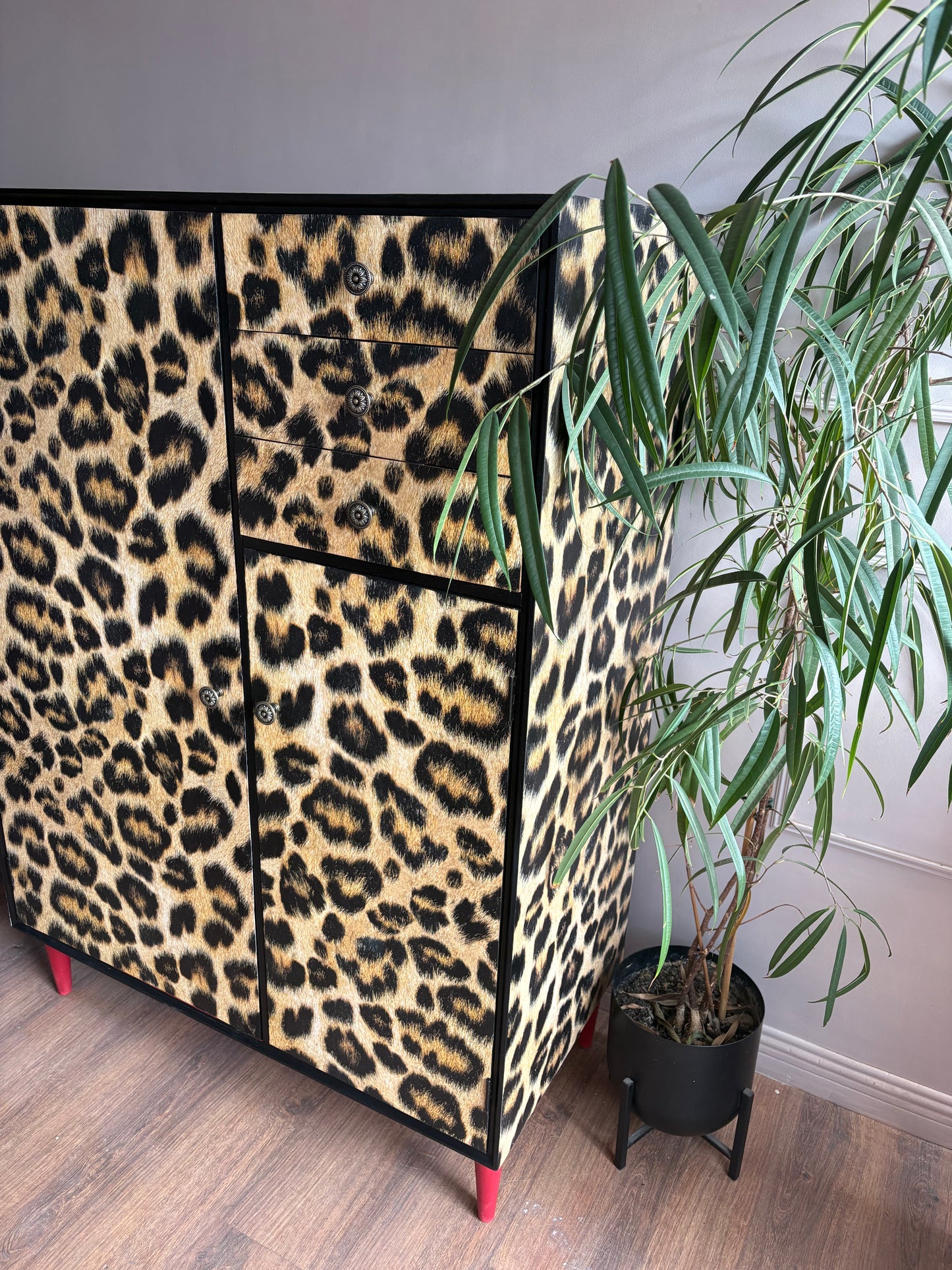 Leopard print wallpapered storage cabinet gentleman’s wardrobe upcycled refurbished