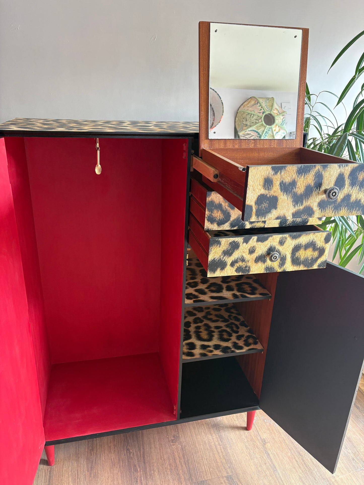 Leopard print wallpapered storage cabinet gentleman’s wardrobe upcycled refurbished