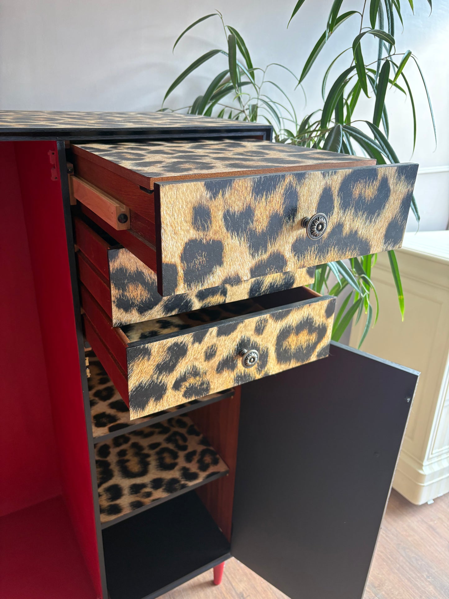 Leopard print wallpapered storage cabinet gentleman’s wardrobe upcycled refurbished