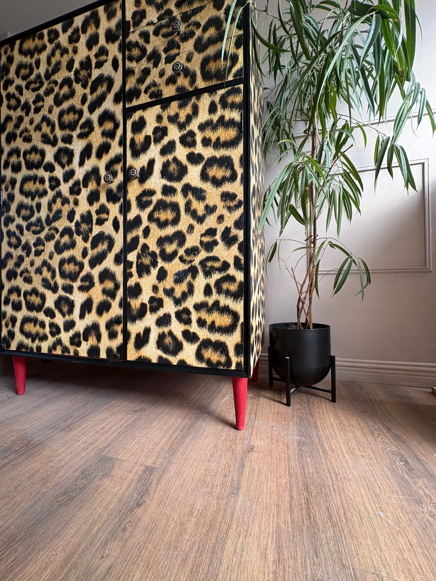 Leopard print wallpapered storage cabinet gentleman’s wardrobe upcycled refurbished
