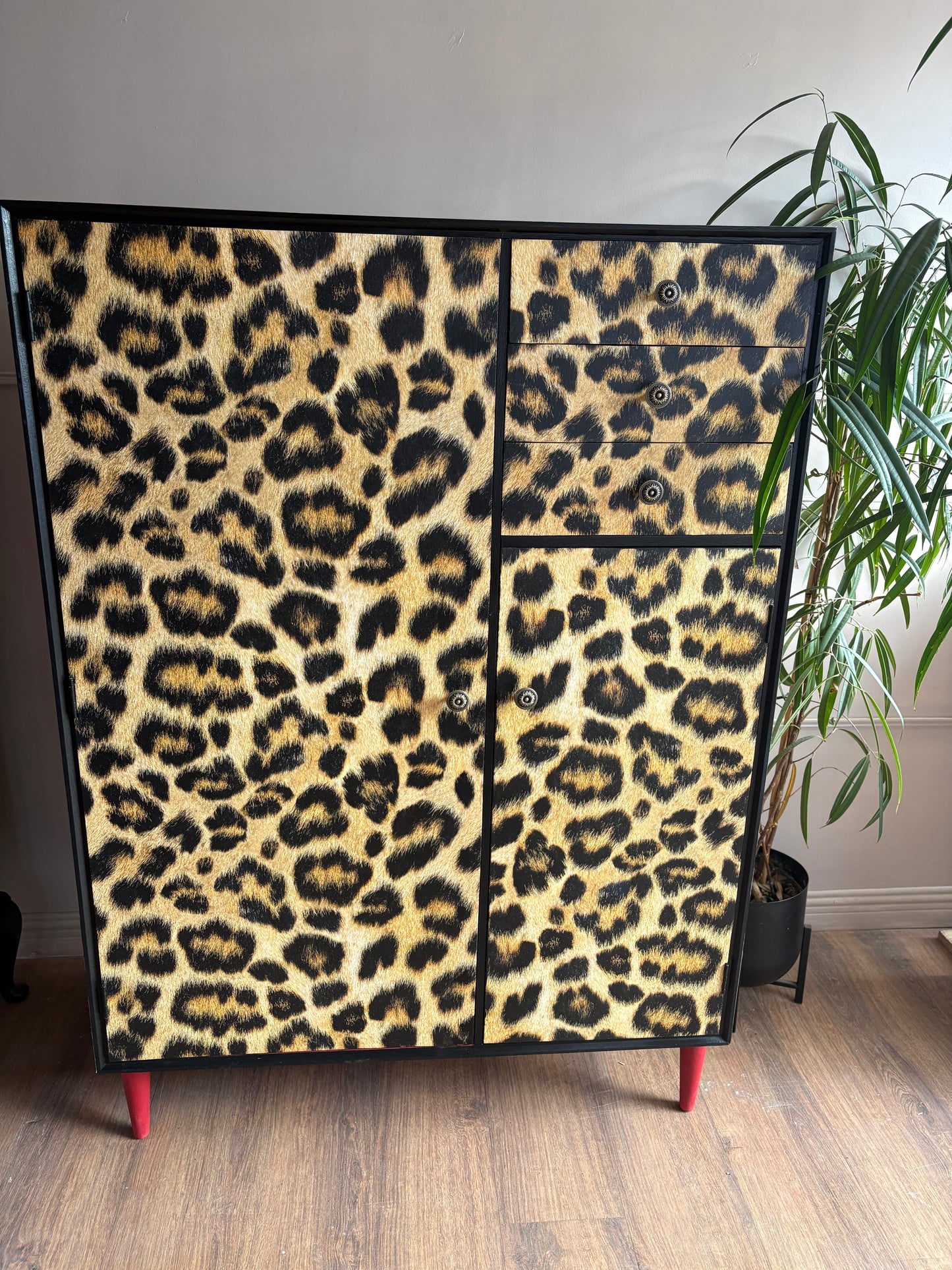 Leopard print wallpapered storage cabinet gentleman’s wardrobe upcycled refurbished