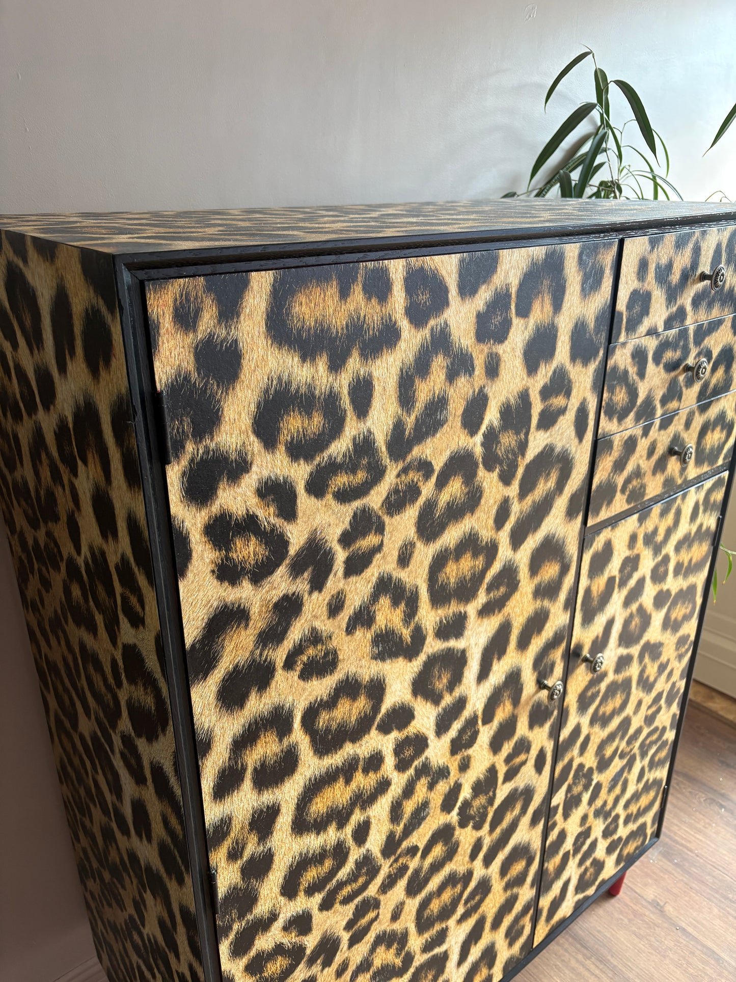 Leopard print wallpapered storage cabinet gentleman’s wardrobe upcycled refurbished